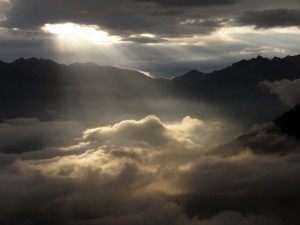 Every Day Sacred - sun beams through cloud cover