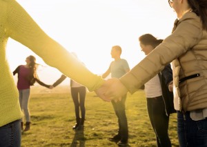 Every Day Sacred - holding hand in a circle